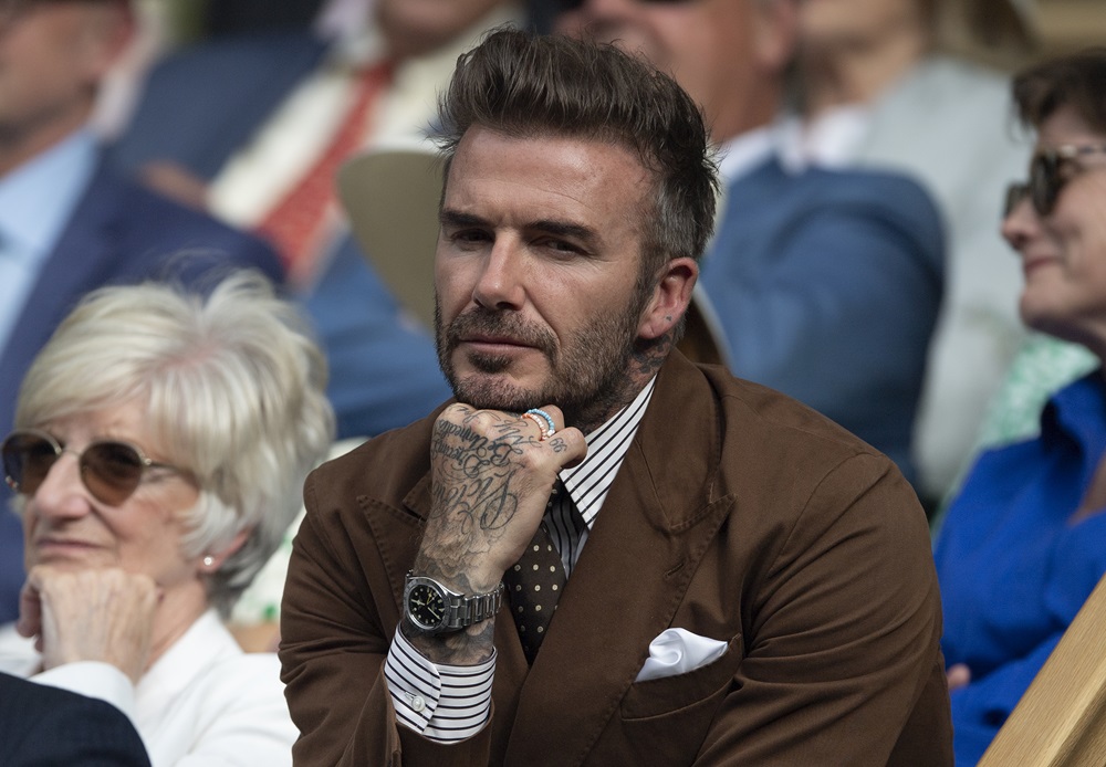 David Beckham s hodinkami na zápěstí